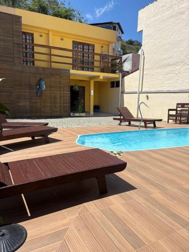 Pontal da Cruz Apartment | 03 Apartamento de praia com ótima localização e piscina