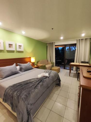 Pontal Apartment | Angra dos Reis - Studio - Condomínio com piscina, bar molhado e marina - Aluguel de Lancha no Local