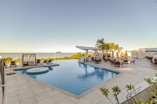 Itacolomi Apartment | Apê Beira Mar com Ar Cond em Condomínio Clube com Piscina, Churrasqueira, Proximo ao Beto Carrero