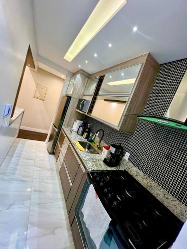 Vila Julia Apartment | Ap Moderno com vista mar Piscina Ar Condicionado no Guarujá
