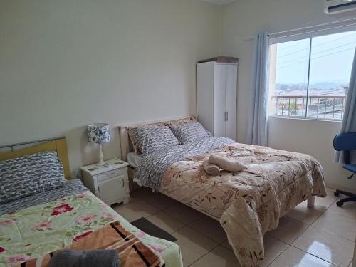Santo Angelo Apartment | Apart próximo a Unimed, Catedral e HSA com 2 quartos com 2 ARES e garagem