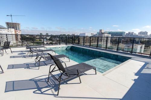 Novo Mundo Apartment | Apartamento 202 - New England · Studio com A/C, Piscina, Academia & Pet Friendly