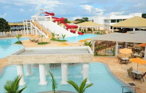 Centro Apartment | Apartamento em Caldas Novas com Parque Aquático 24h e Piscinas Aquecidas