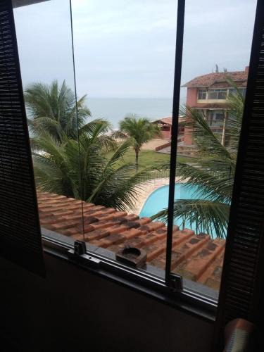 Rio das Ostras Apartment | Apartamento pé na areia dois quartos piscina e lazer!
