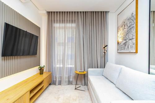 Bigorrilho Apartment | Apartamento refinado em prédio com piscina-TEM0403