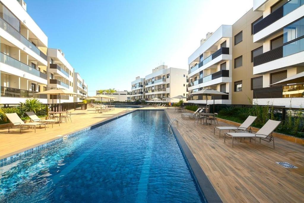 Cachoeira do Bom Jesus Apartment | Apto 100m da Praia Com Piscina Aquecida e Lazer