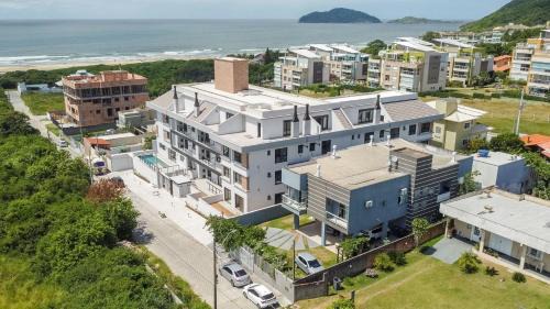 Santinho Apartment | Apto Gerânio 200m da praia by Achei Florianópolis