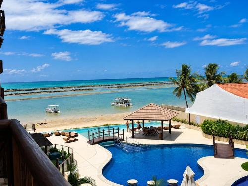 Barra de Sao Miguel Apartment | Beachfront Apartment, Infinity Pool, Jacuzzi in BSM | Destination BSM 327