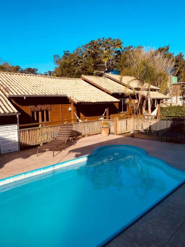 Praia do Rosa Ski Chalet | Cabanas Alamanda do Rosa