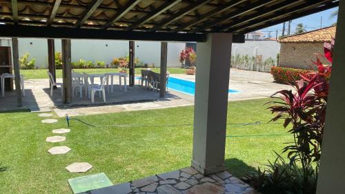 Aruana House | Casa aconchegante com piscina e muito espaço verde