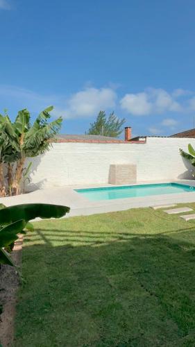 Tramandai House | Casa ampla com piscina próxima ao mar