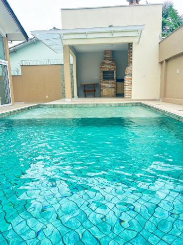 Toninhas House | CASA AQUAMARINE