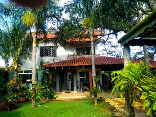 Caranda Bosque House | Casa Carandá