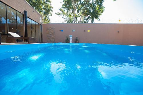 Jardim Paraiso House | Casa com 5 suítes próximo ao lago Corumbá