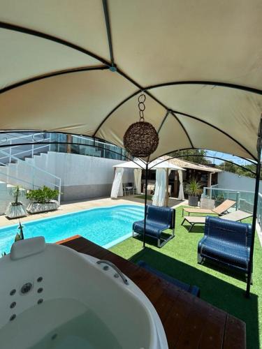 Nova Guarapari Apartment | Casa com piscina área gourmet Enseada Azul