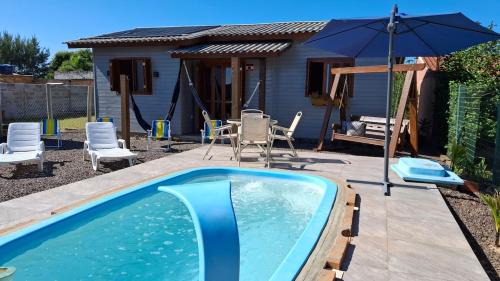 Curumim House | Casa com piscina aquecida, 3 quartos e 3 camas extras