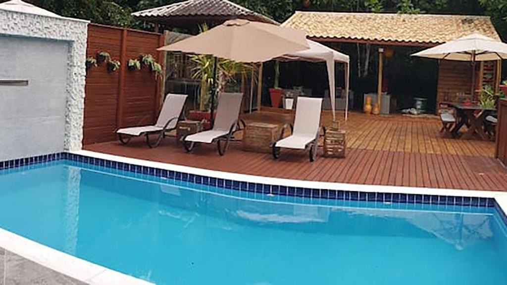 Caraguatatuba House | Casa com piscina e churrasqueira em Massaguaçu SP