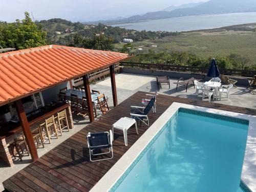 Garopaba House | Casa com piscina e incrível vista para lagoa