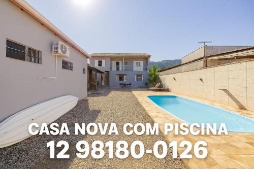 Taquaral House | Casa de 4 suites com piscina, próxima a praias e do centro de Ubatuba