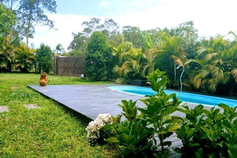 Ibiraquera House | Casa de Férias com Piscina na Praia do Rosa/SC