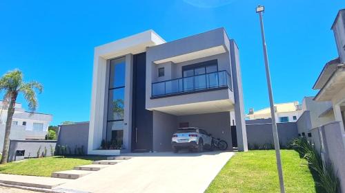 Capivari House | Casa de luxo com 4 Suites Praia dos Ingleses, SC