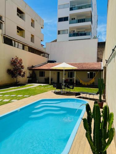 Praia do Morro Apartment | Casa de Praia com Piscina e Churrasqueira a 280m da Praia do Morro - 3 quartos com Ar Condicionado, sendo 2 suítes- Quintal amplo, ideal para famílias