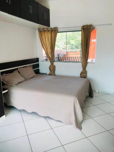 Caravelas House | Casa de Praia com Varandao Gourmet a 5 min do Mar