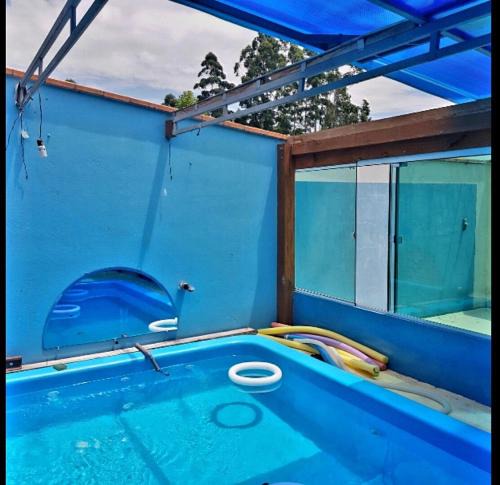 Rio do Sul House | Casa de sítio com piscina coberta, sala de jogos e fogão a lenha