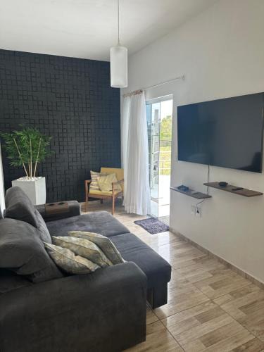 Canasvieiras House | Casa em Florianópolis no bairro de Canasvieiras com sacada e churrasqueira!