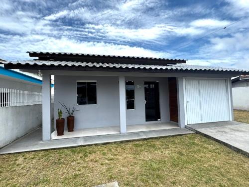 Porto da Vila House | Casa em Imbituba SC, perto das Praias e Lagoa