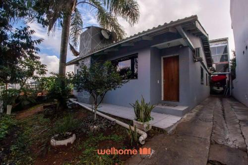 Petropolis House | Casa em Passo Fundo com Churrasqueira