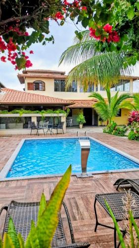 Rio das Ostras House | Casa Linear Térrea com Piscina no Atlântico