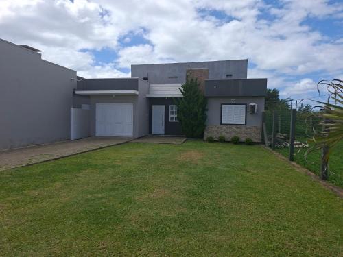 Presidente House | Casa Müller - Veraneio Imbé