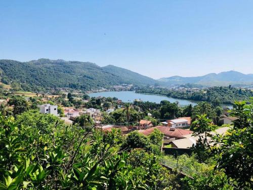 Regiao Urbana Homogenea I House | Casa para temporada, represa Bortolan Poços de Caldas