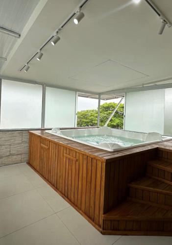 Palhoca Apartment | Casa Premium com Jacuzzi e Churrasqueira