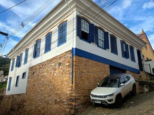 Ouro Preto Hotel | CASA RAIZ cama café e prosa