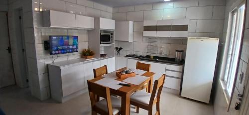 Capao da Canoa House | Casa reformada com Wi-Fi, garagem e lavanderia