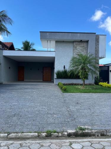 Morada da Praia House | Casa térrea moderna em condomínio