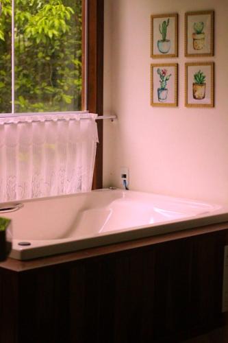 Centro Ski Chalet | Chalé com hidromassagem e vista para o lago em Domingos Martins