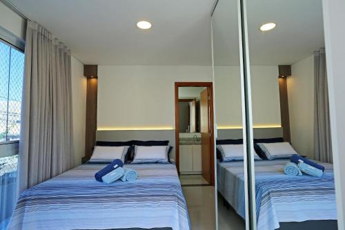 Campeche Central Apartment | Cobertura Duplex no Campeche Florianópolis, 2 quartos com ar-condicionado, 3 banheiros, WiFi 1Gb, Cozinha completa, Estacionamento, Amplo terraço coberto com churrasqueira