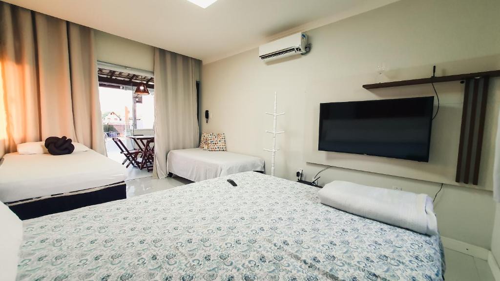 Arembepe Apartment | Confortável casa em Arembepe,100 metros da Praia com Churrasqueira Piscina e Wi-fi