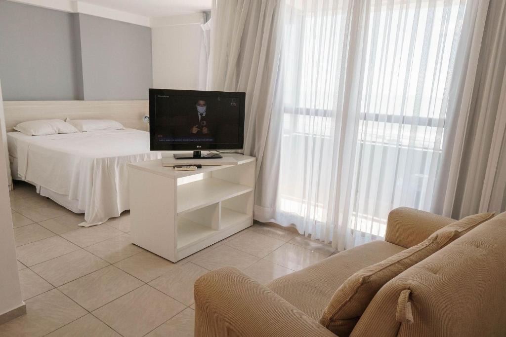 Areia Preta Apartment | Confortável suíte integrada com vista mar em Natal por Carpediem