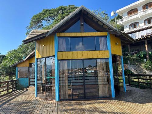 Garopaba Villa | Deck do Baú - Viva essa experiência única