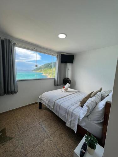 Prainha Apartment | Estalagem pé na areia