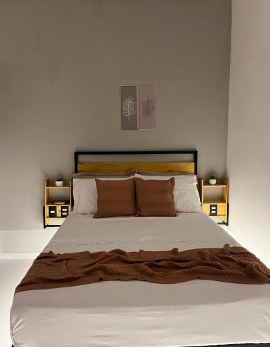 Jardim Ipe Apartment | Flat com ar e varanda com linda vista para o Ibituruna, Wi-Fi - Véu de Noiva 204