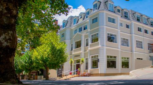 Capivari Apartment | Flats Chateau Campos do Jordão em Capivari com lareira