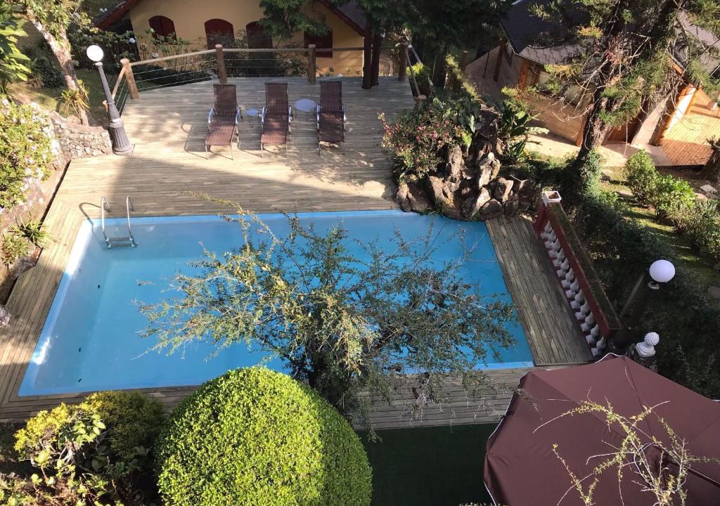 Monte Verde Apartment | Hospedagem Casadalee chalé com piscina privativa aquecida e Apartamento sem piscina