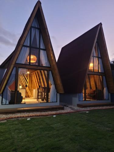 Praia da Armacao do Itapocoroi Ski Chalet | Hospedagem Chalés Prosas e Versos