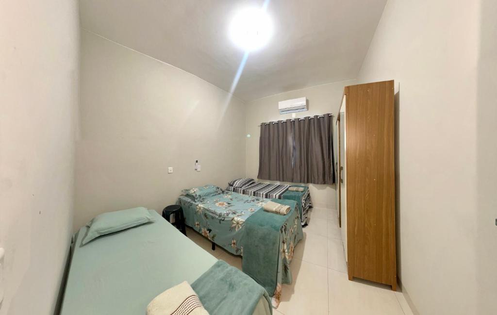 Menino Deus Apartment | Hospedagem Trevisan apartamento terreo com 2 quartos e garagem de 1 a 5 hospedes