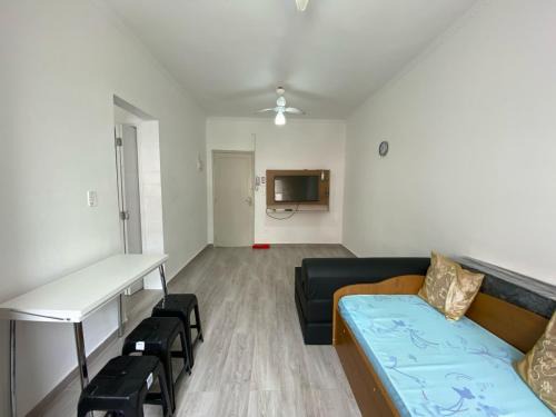Boqueirao Apartment | Kitnet aconchegante no centro, a poucos passos da praia